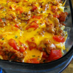 THIS BEEF LOMBARDI IS A HEARTY CASSEROLE WITH GROUND BEEF, EGG NOODLES, CREAM CHEESE, TOMATOES AND TONS OF FLAVOR!!!
