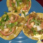 Papas with chorizo and egg tostada
