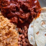 Chile Colorado with rice & beans plate