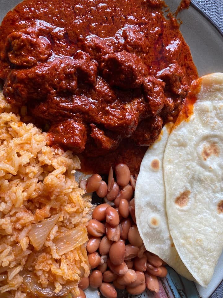 Chile Colorado with rice & beans plate