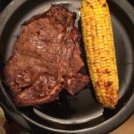 Steak and roasted corn